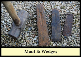 Wedges are driven into the kerf with the maul.