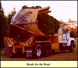 With the Leyland Tilted Forward over the Truck Chassis, Transport Begins