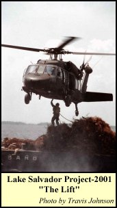 Christmas Tree Sling is attached to Blackhawk Chopper, UH-60A, by Travis Johnson